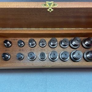 Wooden box with precision measurement gauges inside.