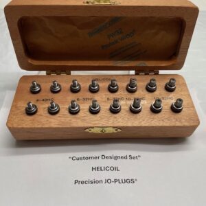 Wooden box with precision plugs set inside.