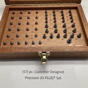 A wooden case containing precision Jo-Plug set.